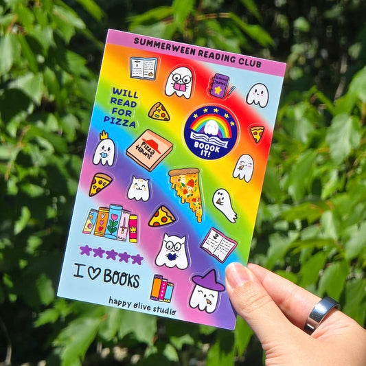 sticker sheet that features ghosts reading books and eating pizza. there are pizza slices, books, stars, and quotes that say 'i love books' and 'will read for pizza' and a badge that says BOOOK IT. Also pizza box that says pizza haunt. All against a rainbow background