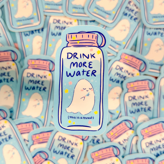 Sticker with 'Drink More Water' text on a blue background, surrounded by similar stickers.